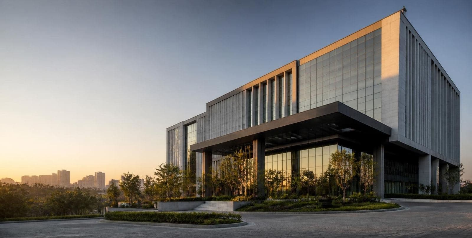 Glass-fronted commercial building at dusk